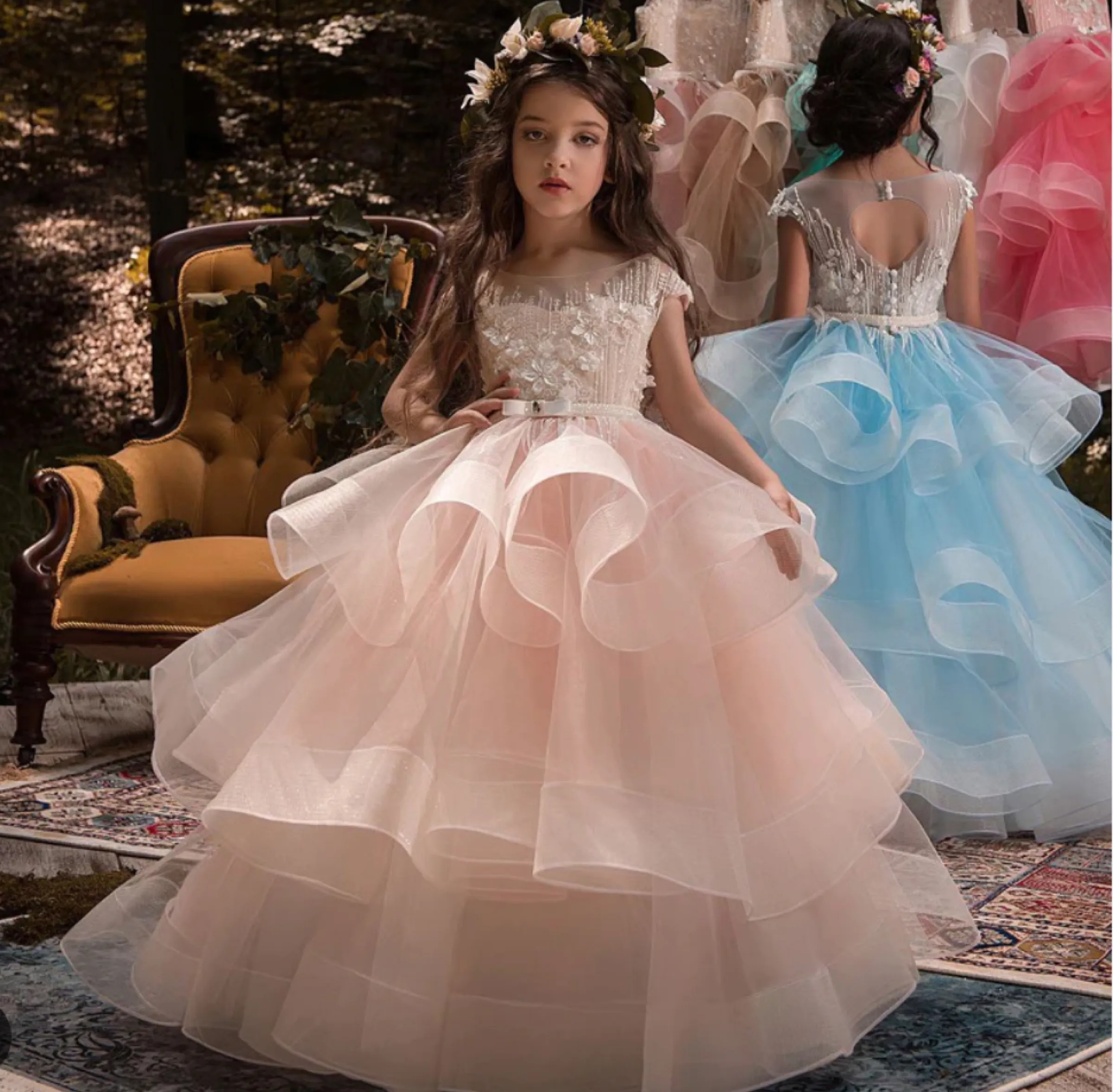 Girls in blush and blue mini quince dresses