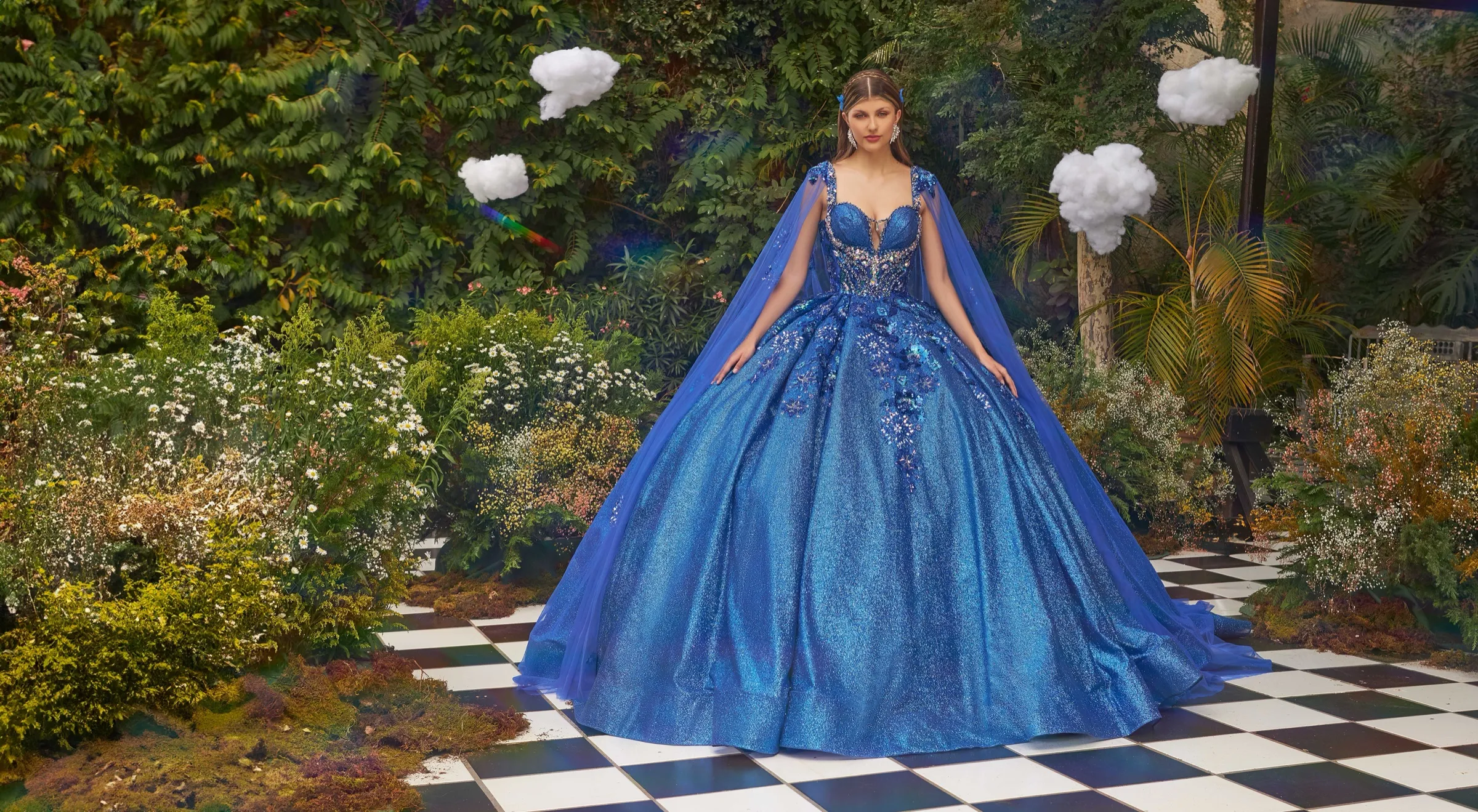 Royal blue gown on a checkerboard courtyard