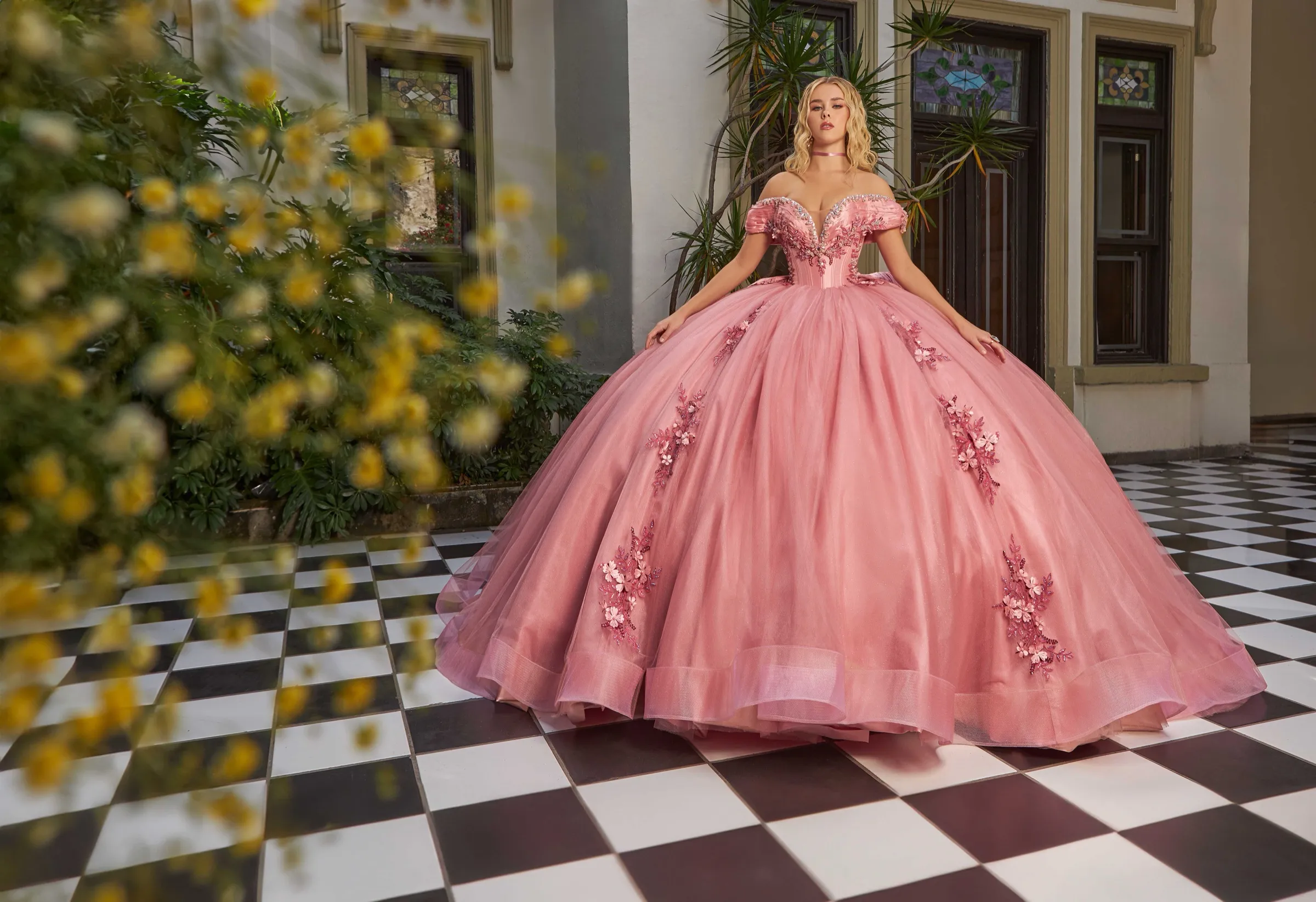Pink ballgown in a garden