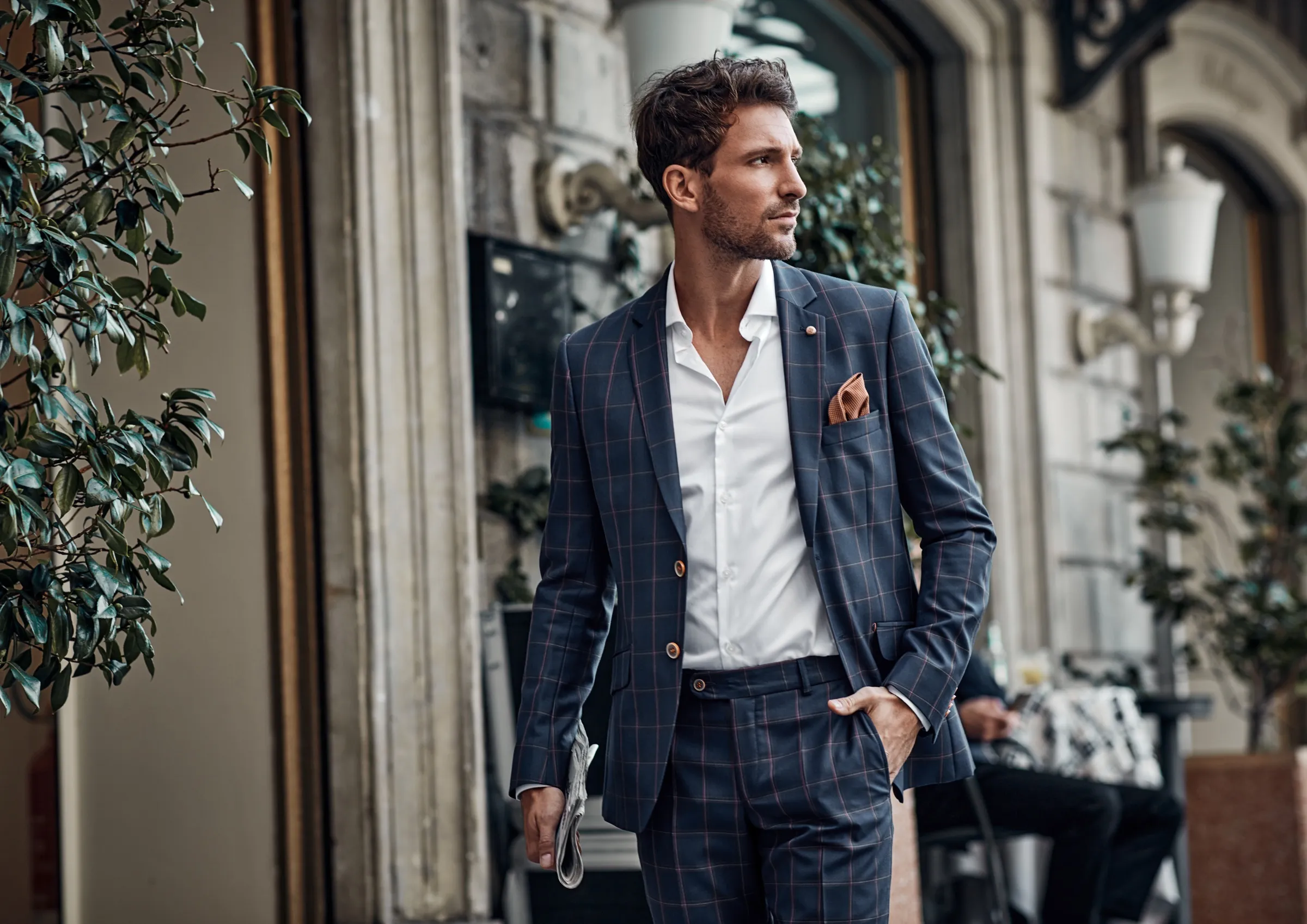 Man in a fitted navy suit